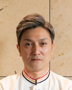 譚 澤明氏